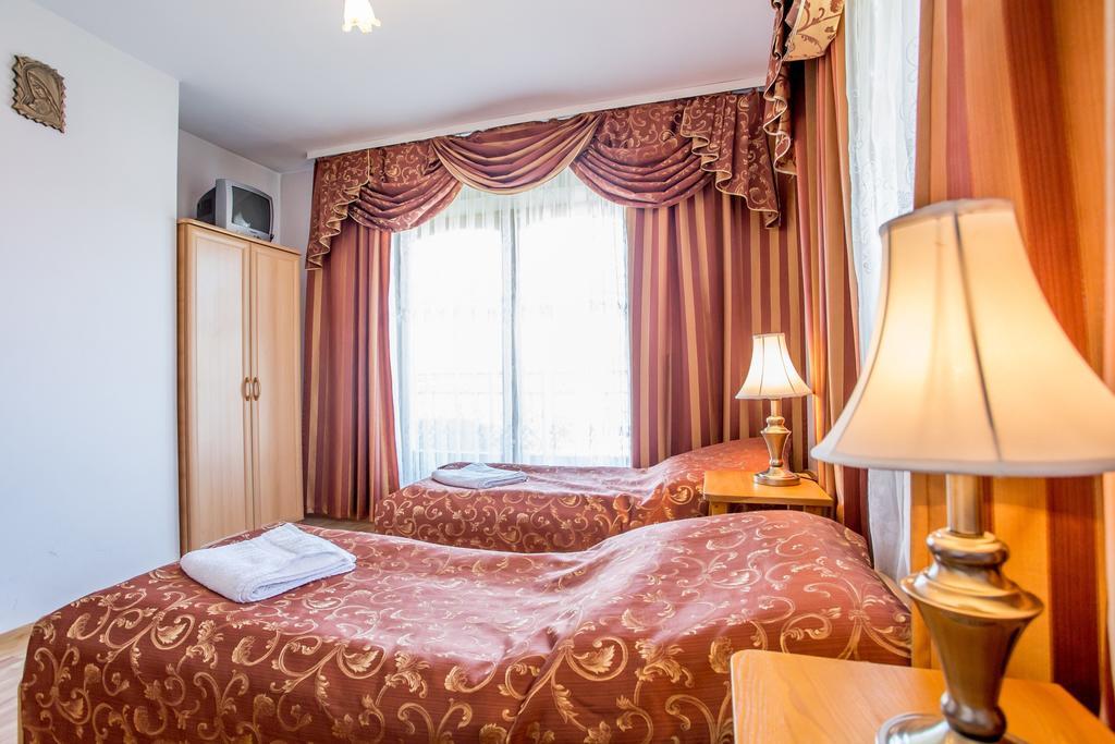 Pod Modrzewiami Hotel Zakopane Kamer foto