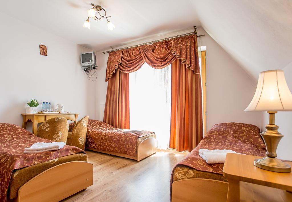Pod Modrzewiami Hotel Zakopane Kamer foto